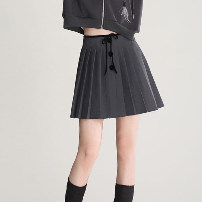 プリーツスカート 前ボタン飾り細プリーツミニスカート